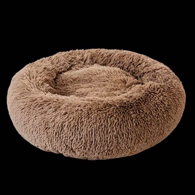 Brown fluffy pet bed on a white background