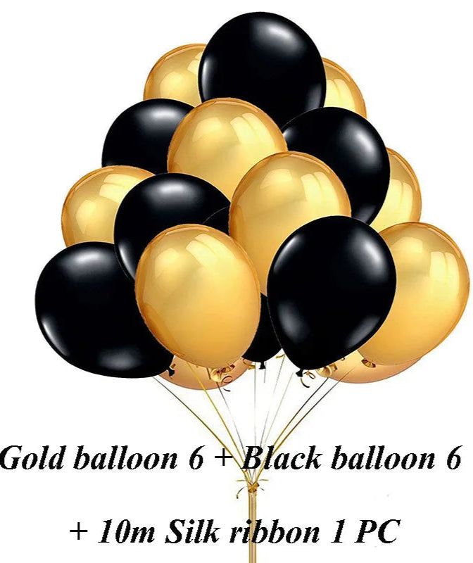 Bunch of gold and black balloons with a silk ribbon on a white background