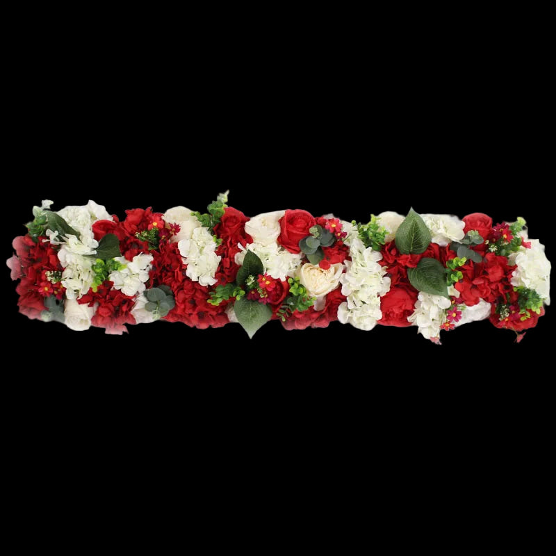 Floral garland with red, white, and green flowers on a white background