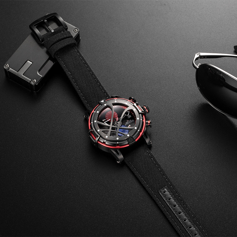 Luxury watch with black strap and red accents on a dark surface
