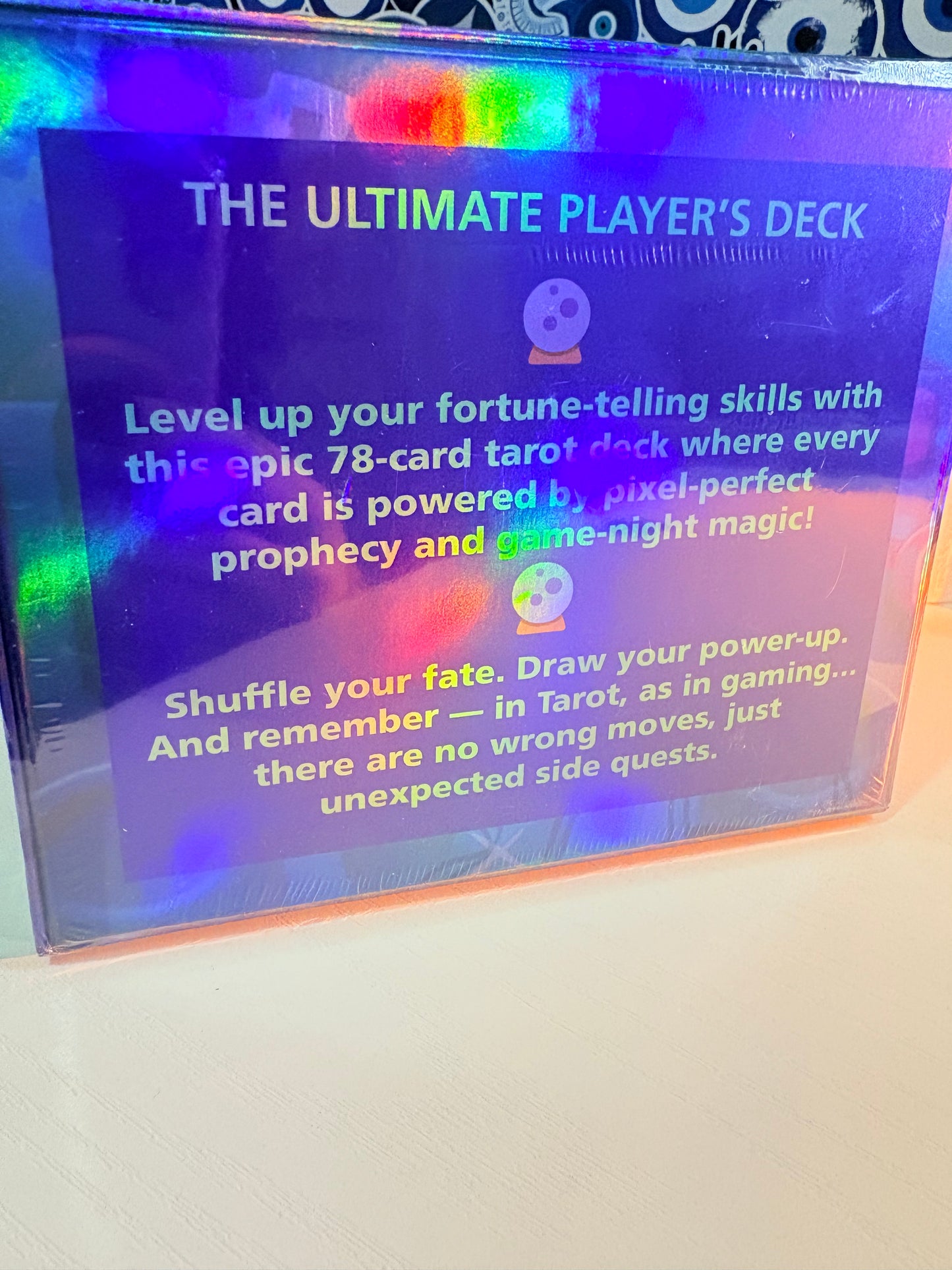 Card game packaging with colorful text on a white background