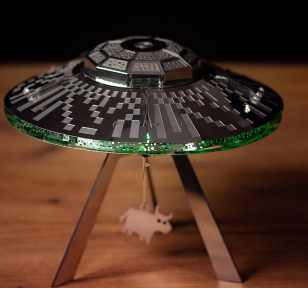 Model of a UFO on a stand with a blurred background
