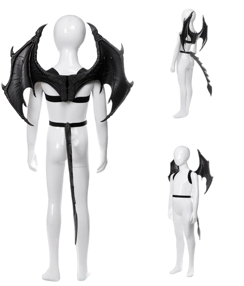 Black and white costume with dragon-like wings on a mannequin against a white background