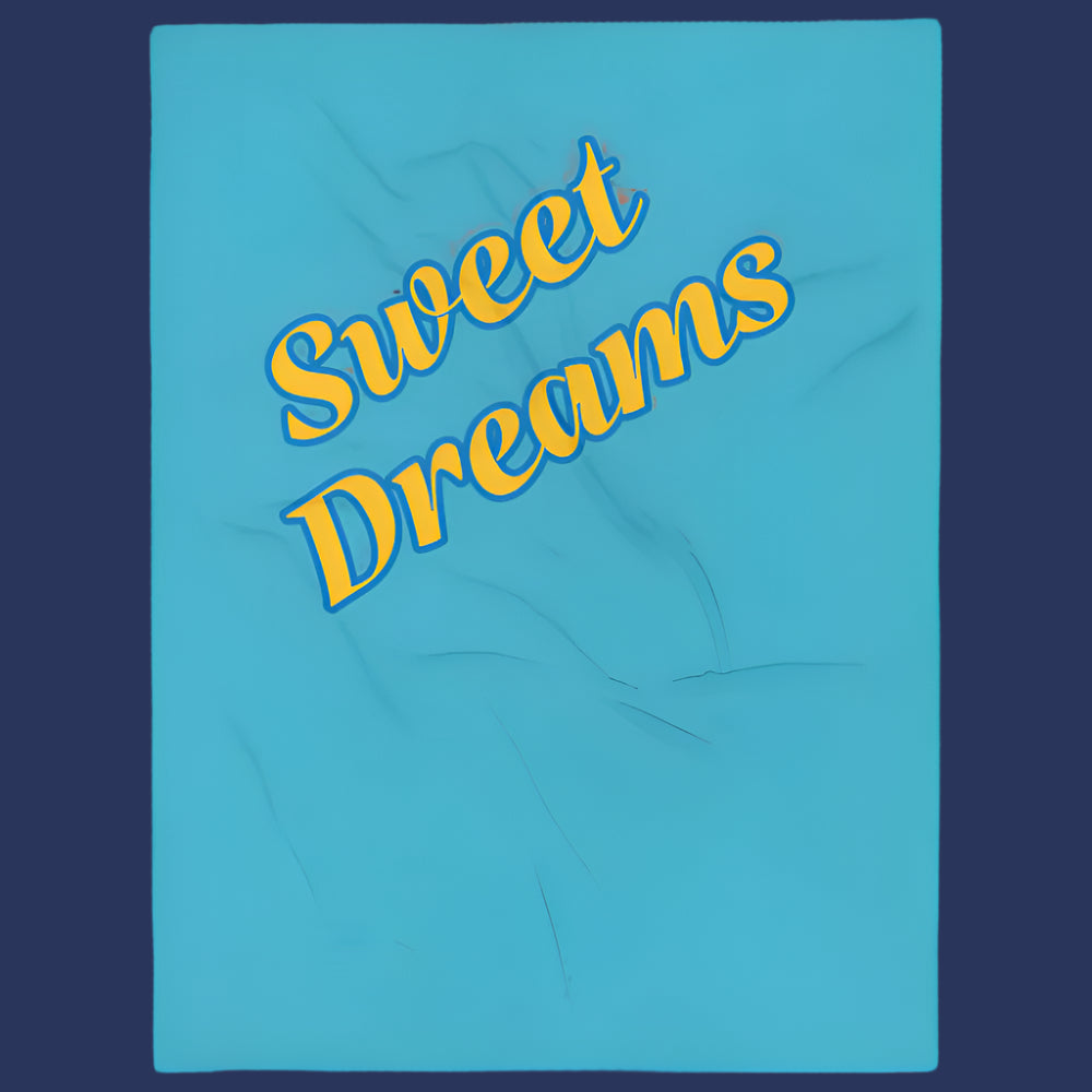 Blue blanket with 'Sweet Dreams' text in yellow on a white background