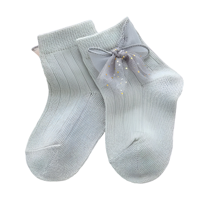 Gray socks with a bow on a light background