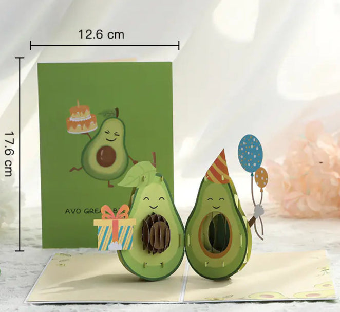 Avocado-shaped greeting card with measurements on a white background