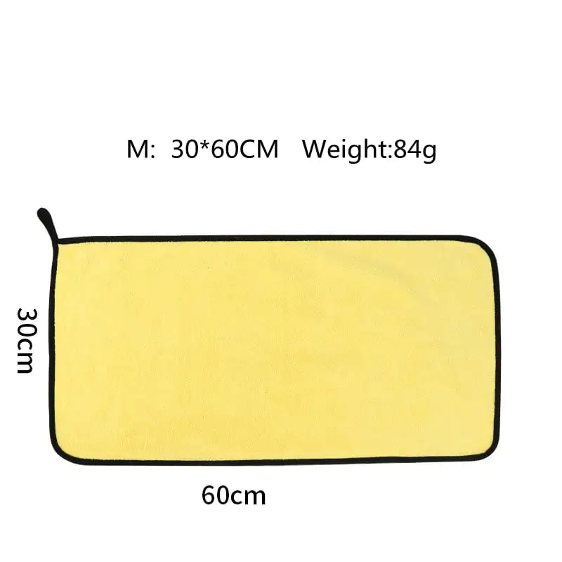Yellow towel with dimensions and weight on a white background