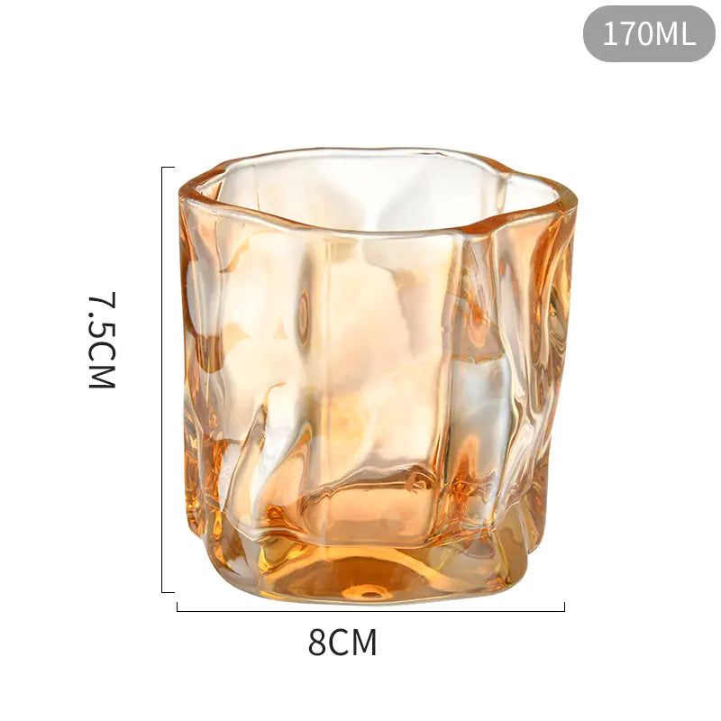 Glass candle holder with measurements on a white background