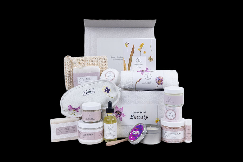 Collection of beauty products including jars, bottles, and a box on a white background