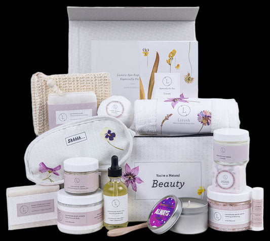 Collection of beauty products including jars, bottles, and a box on a white background