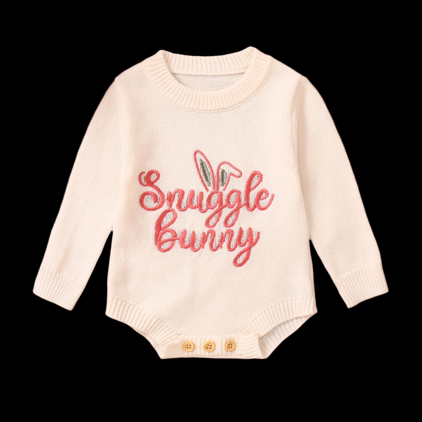 Baby sweater with 'Snuggle Bunny' text on a white background
