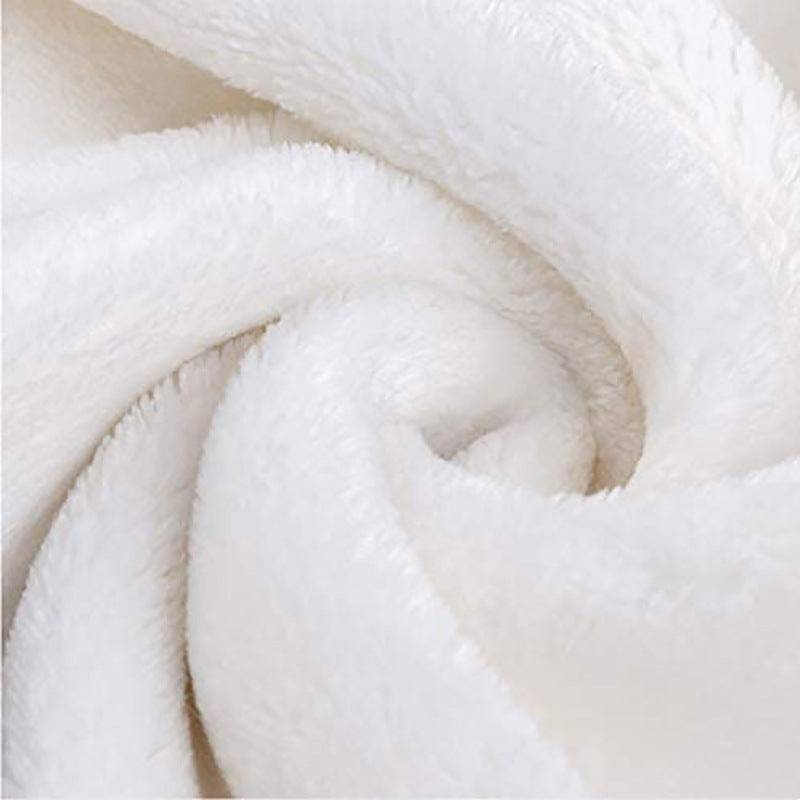 Close-up of a white fluffy blanket
