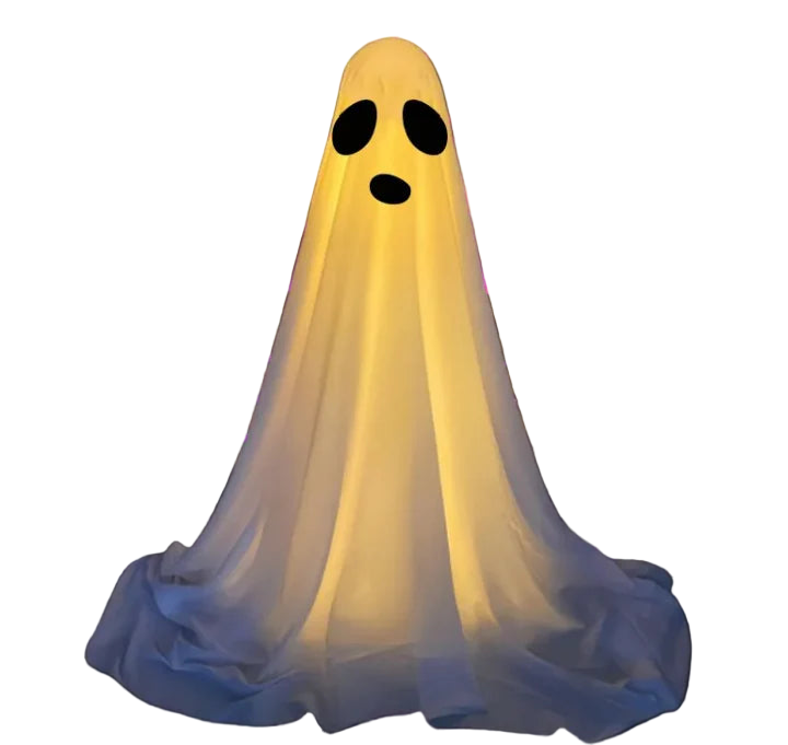 Ghost costume with black eyes against a dark background with purple lighting