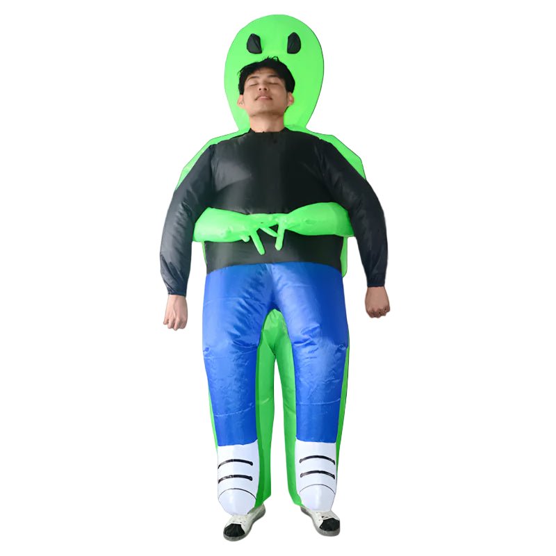 Person wearing an inflatable alien costume on a white background