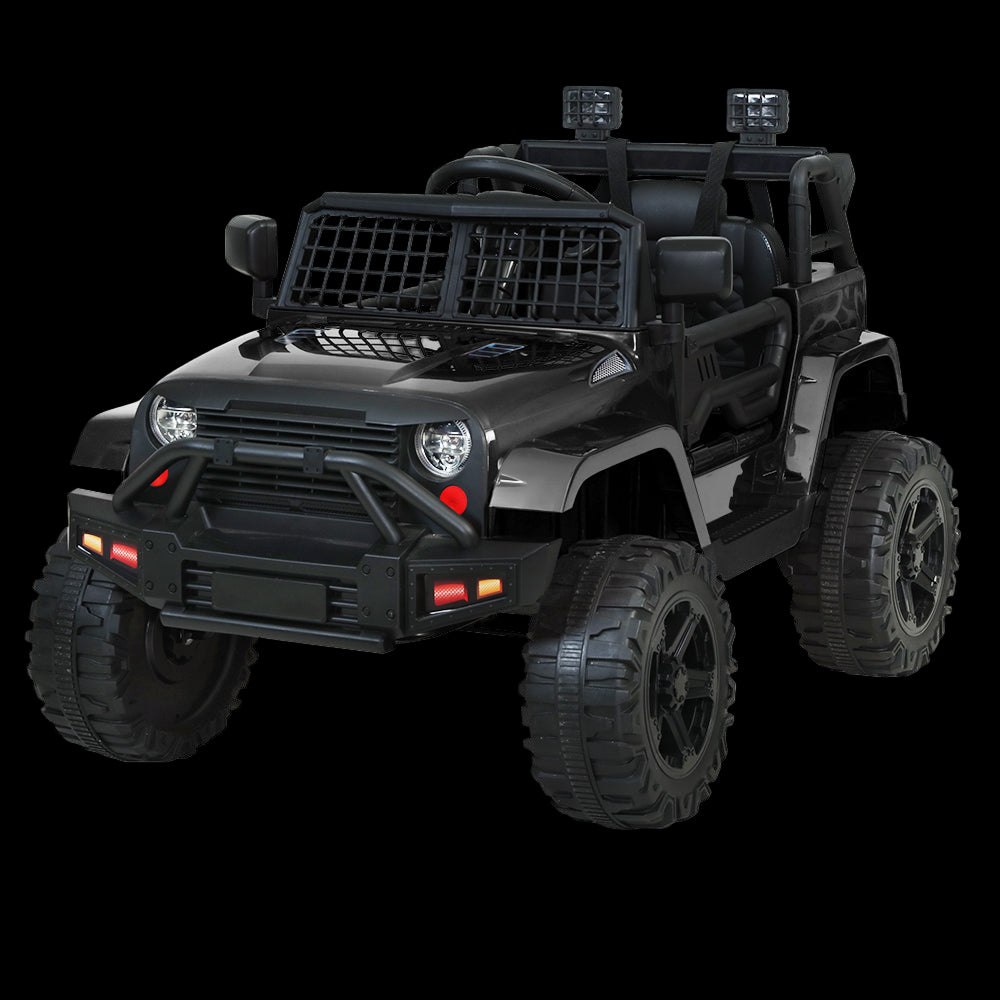 Black toy off-road vehicle with large wheels on a white background