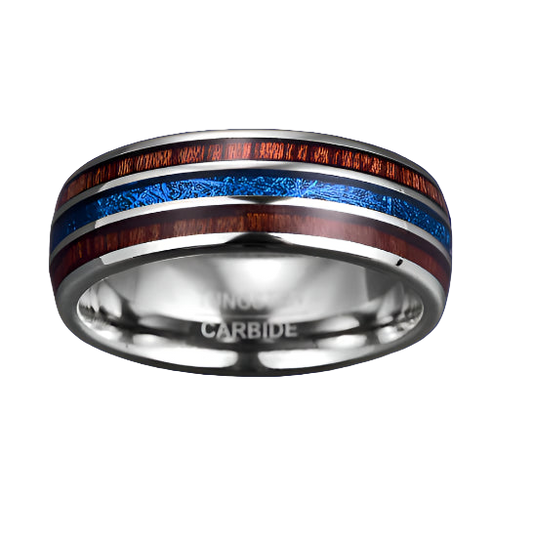Silver ring with red and blue inlay on a gray background