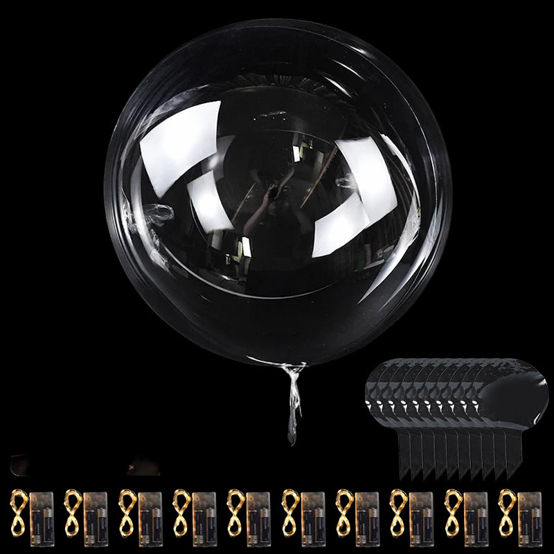 Clear reflective ball with attachments on a black background