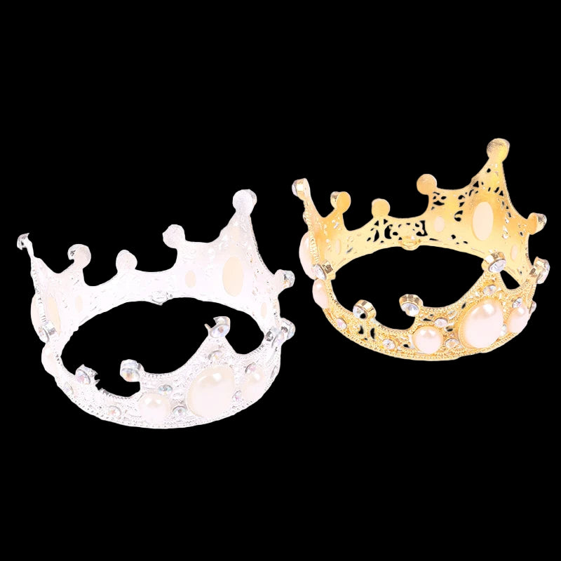 Two crowns, one gold and one silver, on a white background
