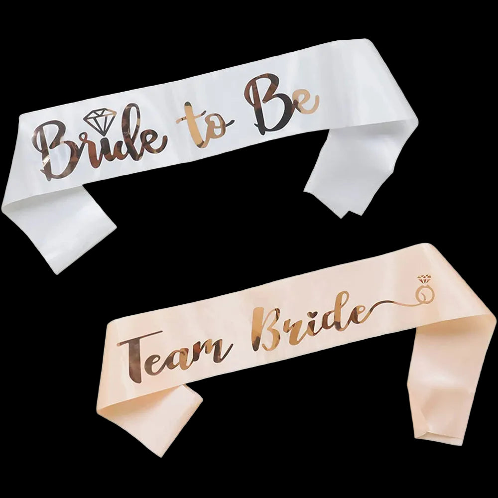 Two satin sashes with 'Bride to Be' and 'Team Bride' text on a white background.