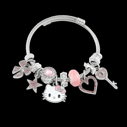 Bracelet with various charms including a Hello Kitty figure, pink heart, and other decorative elements on a white background.