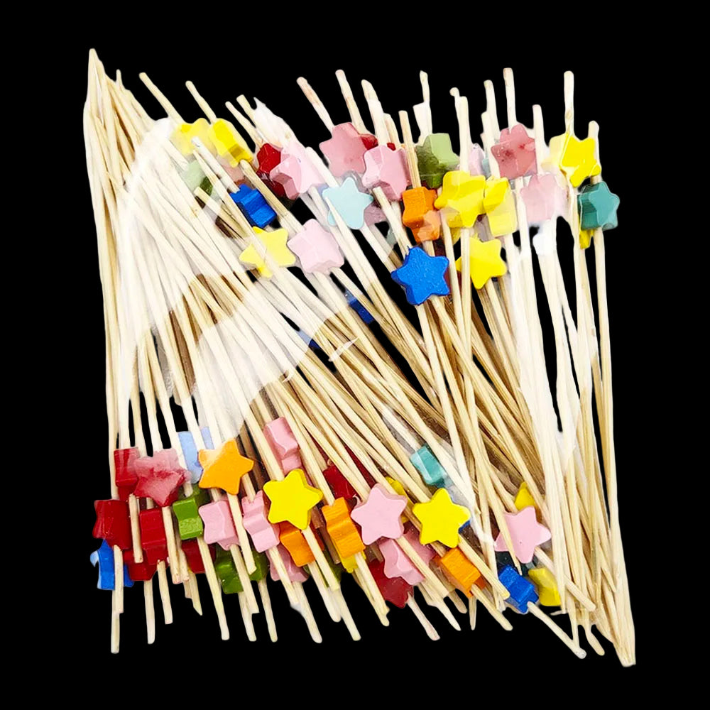 Colorful star-shaped toothpicks on wooden sticks against a white background