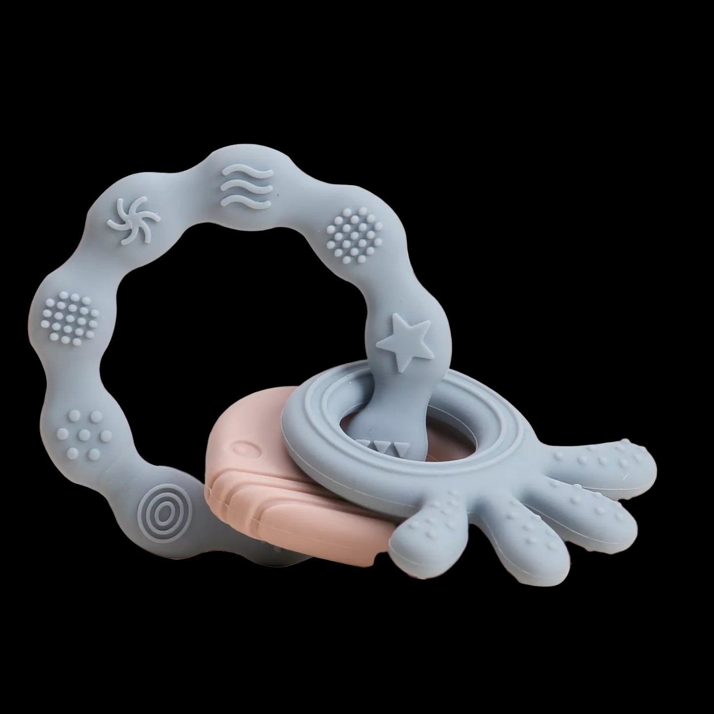 Silicone teething ring with textured surfaces on a white background