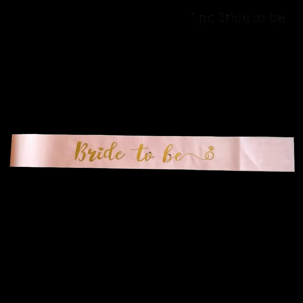 Pink sash with 'Bride to be' text on a white background