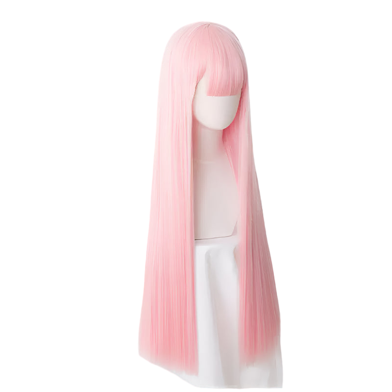 Pink wig on a mannequin head against a white background