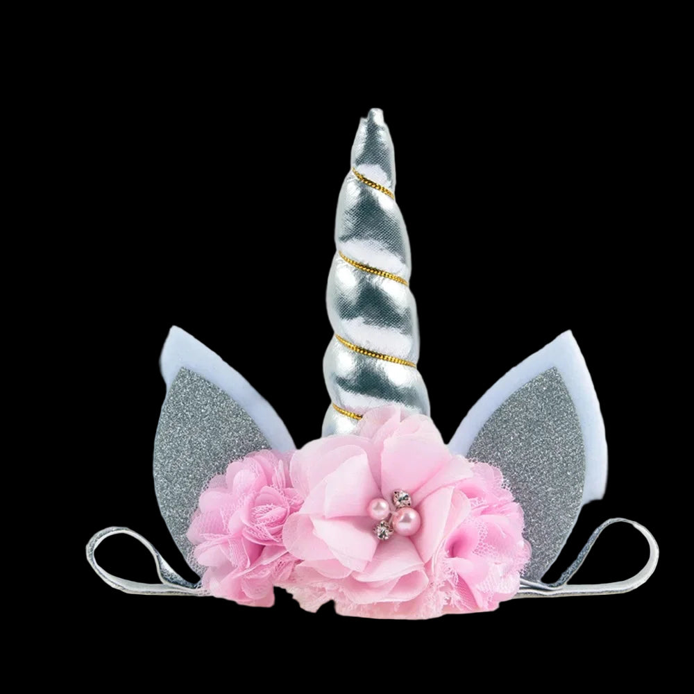 Unicorn horn and ears headband with pink flowers on a white background