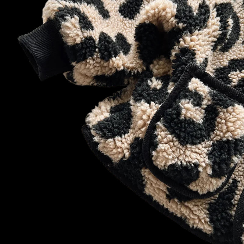 Leopard print gloves on a white background