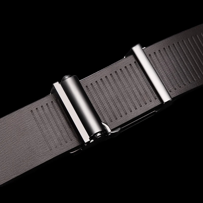 Black belt with silver buckle on a dark gray background