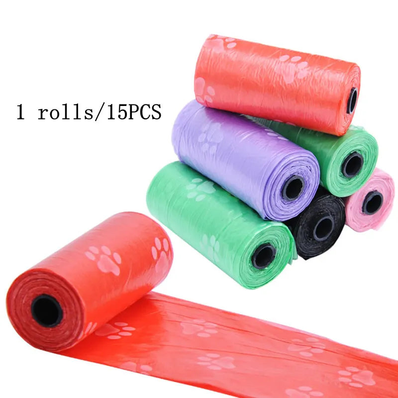 Set of colorful rolls of dog waste bags with a white background