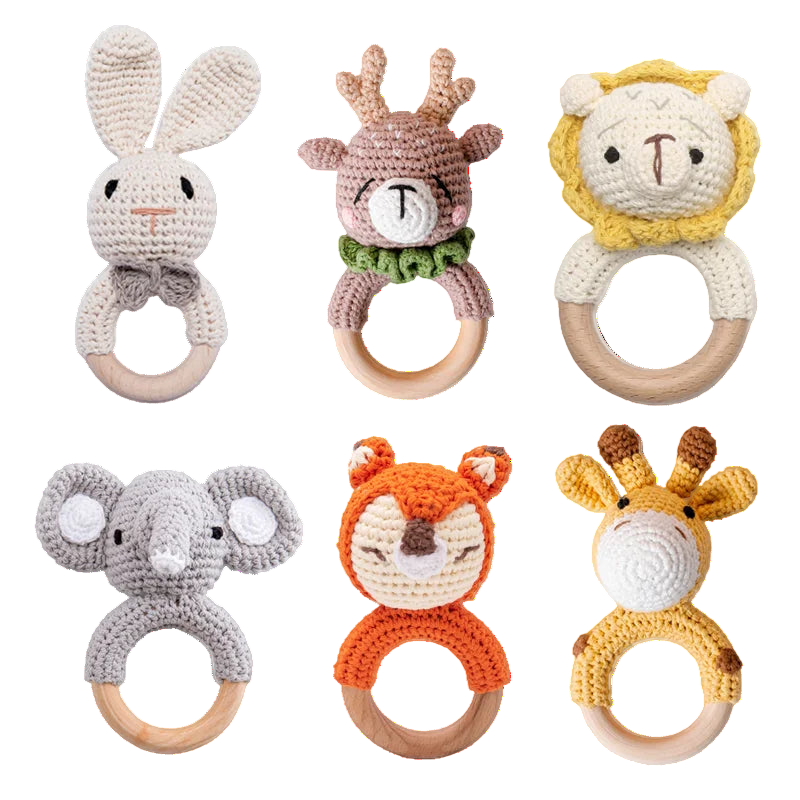 Set of six animal-themed crocheted baby rattle toys on a white background