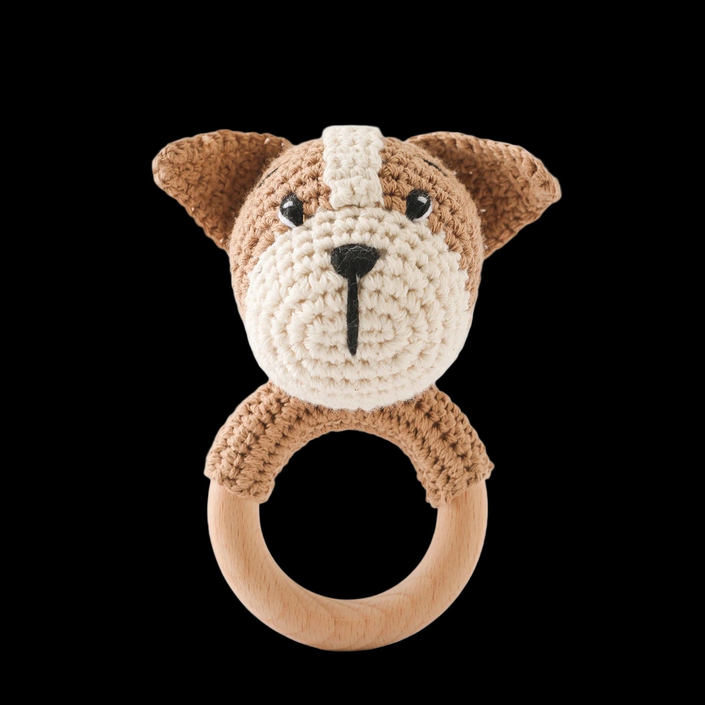 Crocheted dog rattle toy on a white background