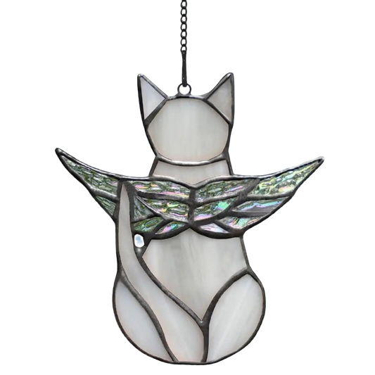 Stained glass angel with iridescent wings on a white background