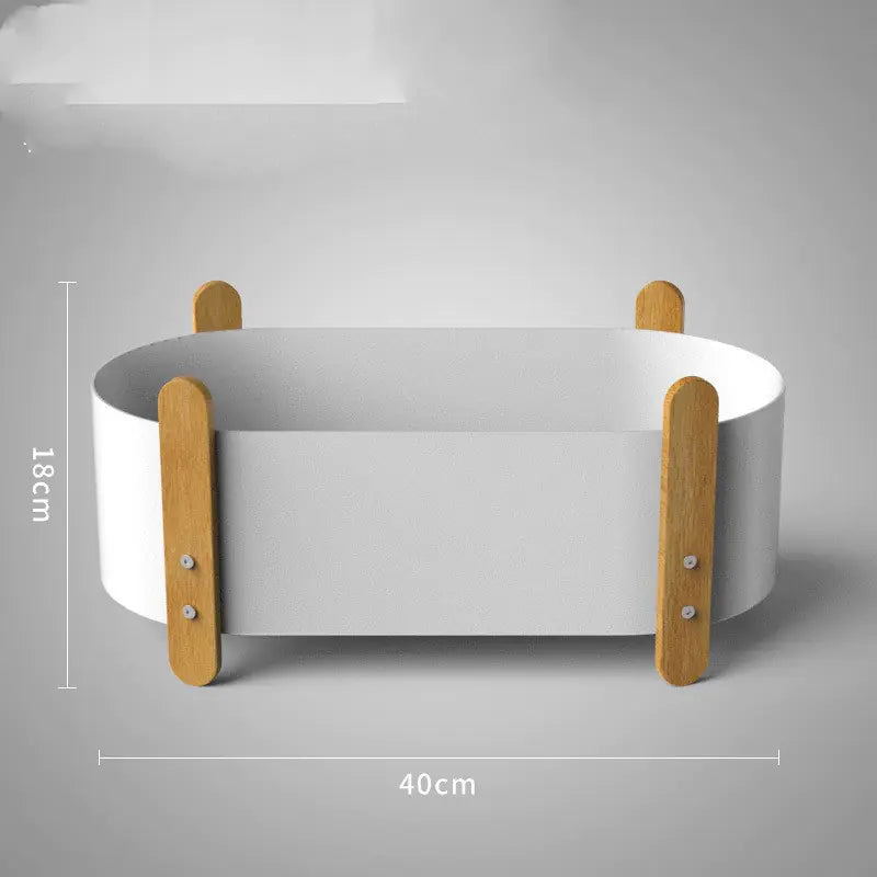 White pet bed with wooden sides and dimensions on a gray background