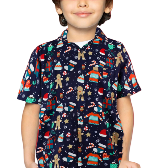 Child wearing a colorful patterned shirt with a white background
