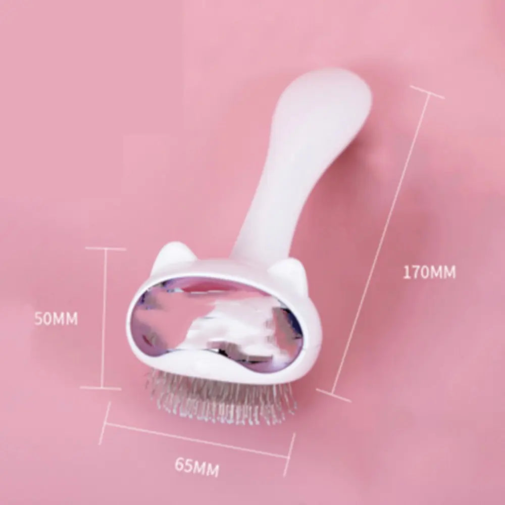 White grooming brush with measurements on a pink background