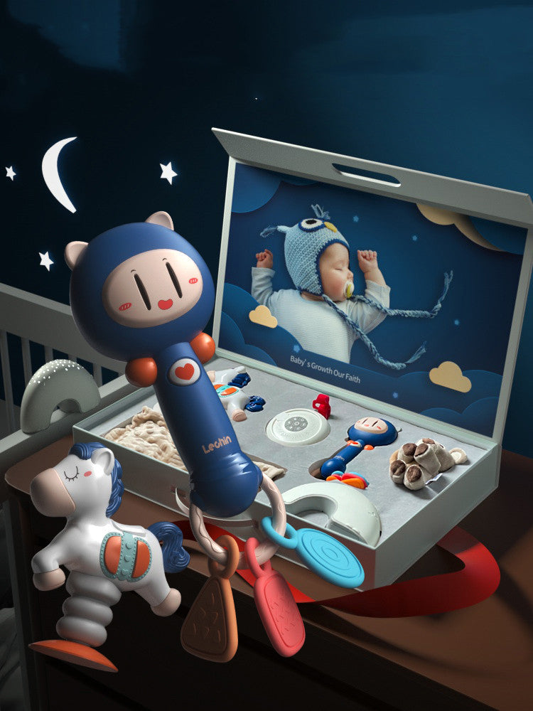 Baby monitor with toys and a nightlight on a crib