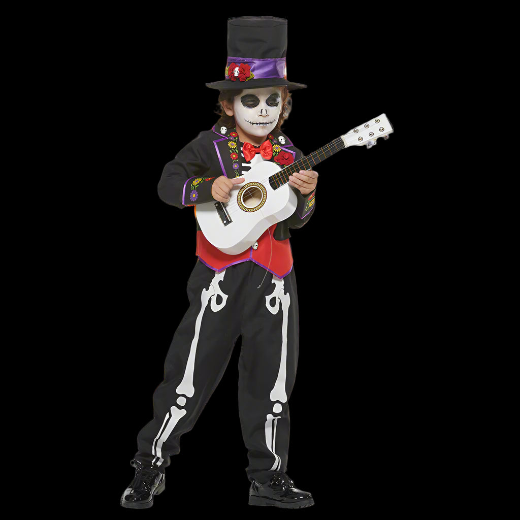 Child in a skeleton costume playing a guitar against a gray background with orange lights.