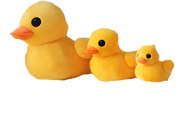 Three yellow rubber duck plush toys on a white surface with a floral-patterned wall in the background.