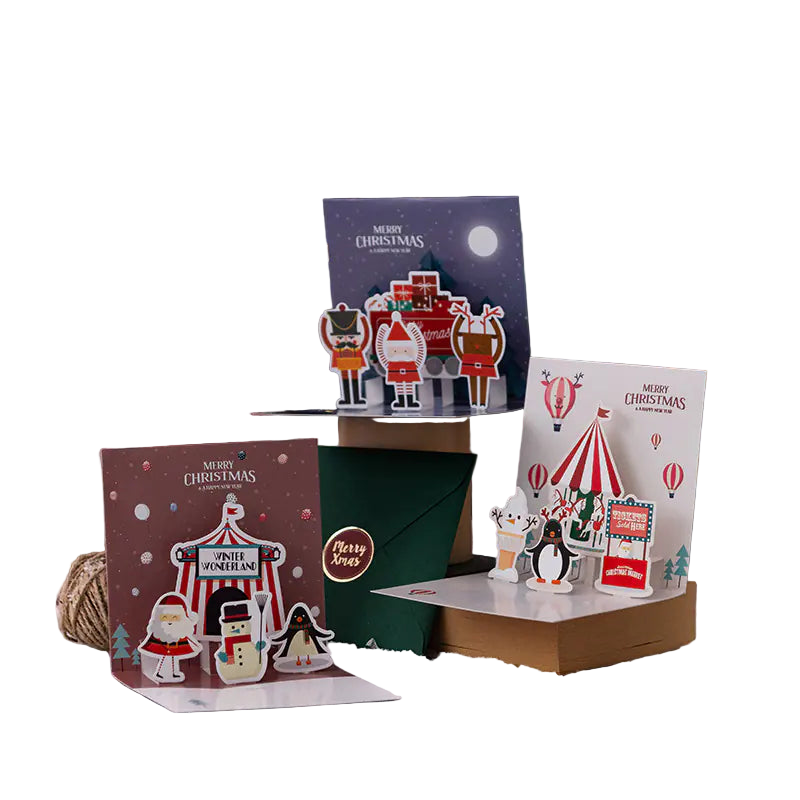 Christmas-themed greeting cards with festive designs on a decorative background.
