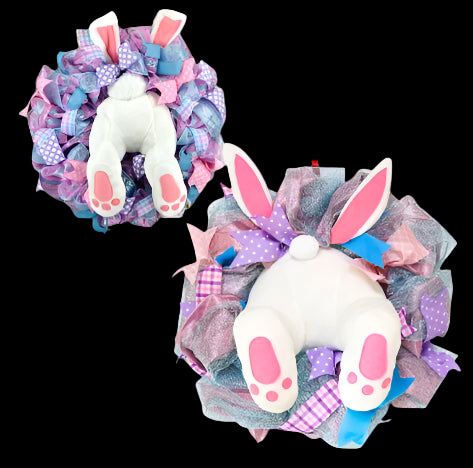 Decorative wreaths with bunny designs on a white background