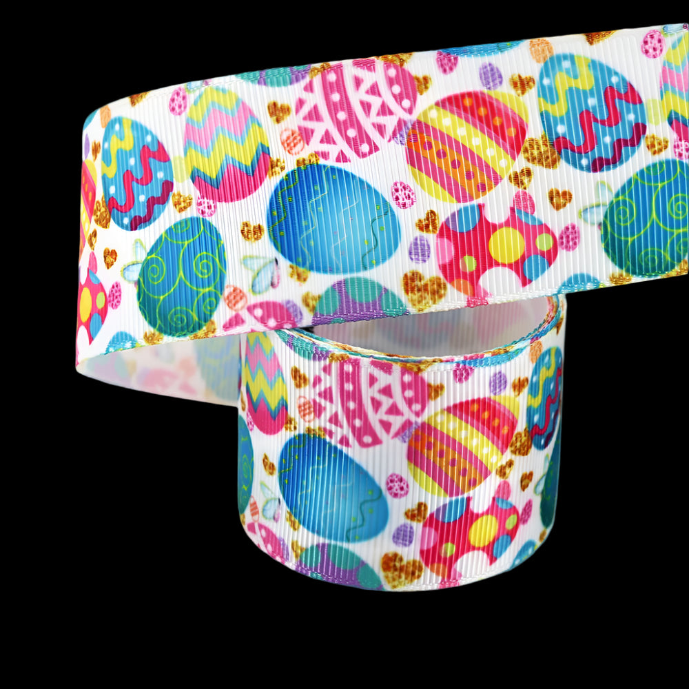 Colorful ribbon with Easter egg pattern on a white background