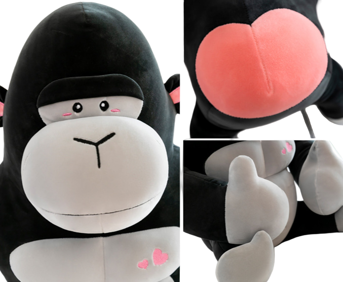 Plush toy with a black and white design, showing different angles.