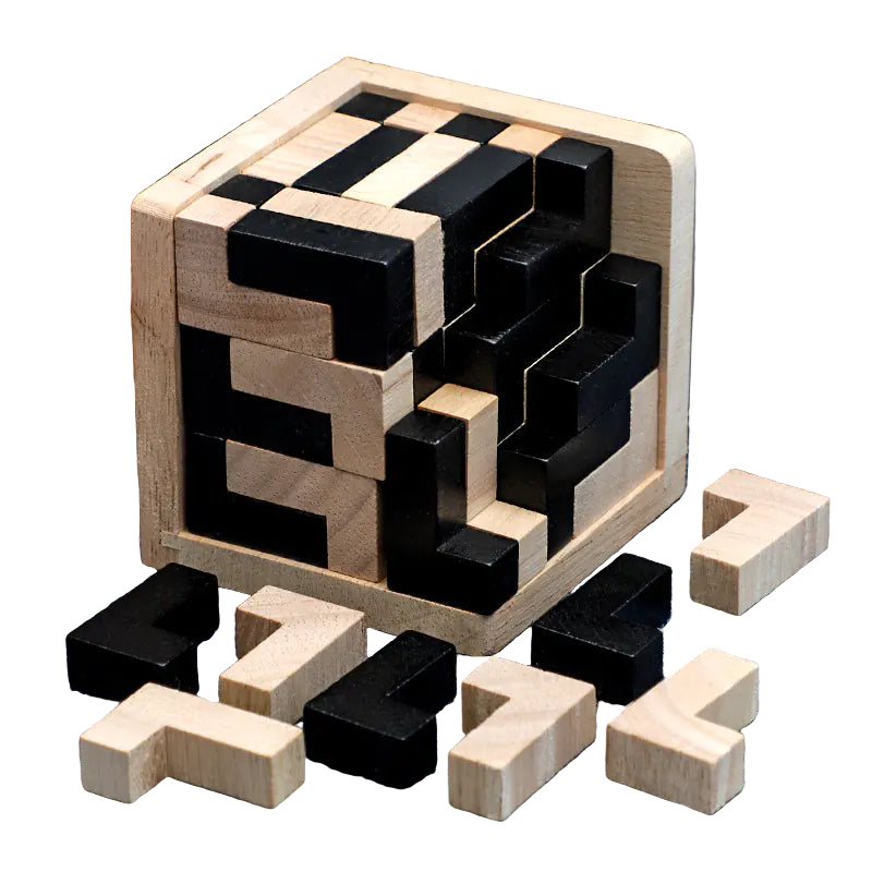 Wooden puzzle with black and natural wood blocks on a textured surface