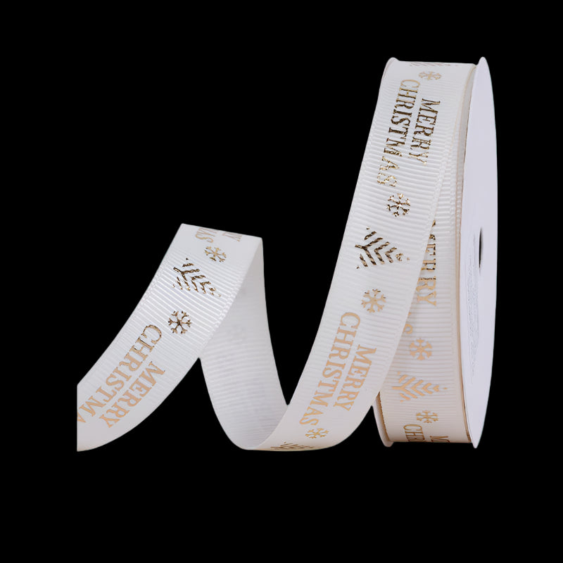 White ribbon with gold 'Merry Christmas' text and snowflake designs on a white background