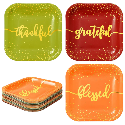 Four square plates with 'thankful', 'grateful', and 'blessed' text on a white background
