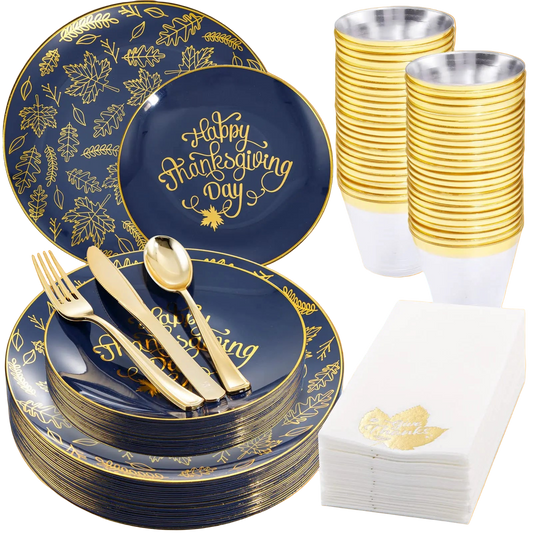Thanksgiving-themed dinnerware set with blue plates, gold cutlery, and cups.
