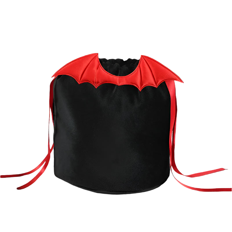 Black bucket bag with red bat wings on a white surface
